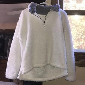 white fuzzy sweater